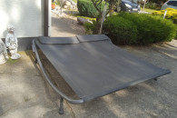 lezak duzy na kolkach 2 osobowy z poduszkami ok