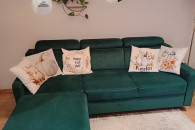 Nowoczesny narożnik w kolorze butelkowej zielen